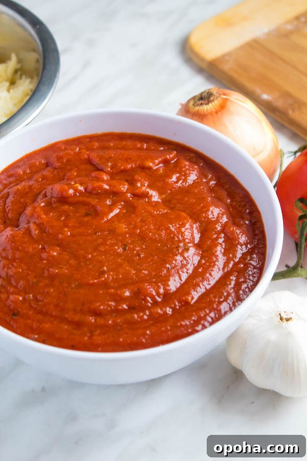Authentic Chicago Deep-Dish Pizza Guide 10 Spoonful of thick pizza sauce