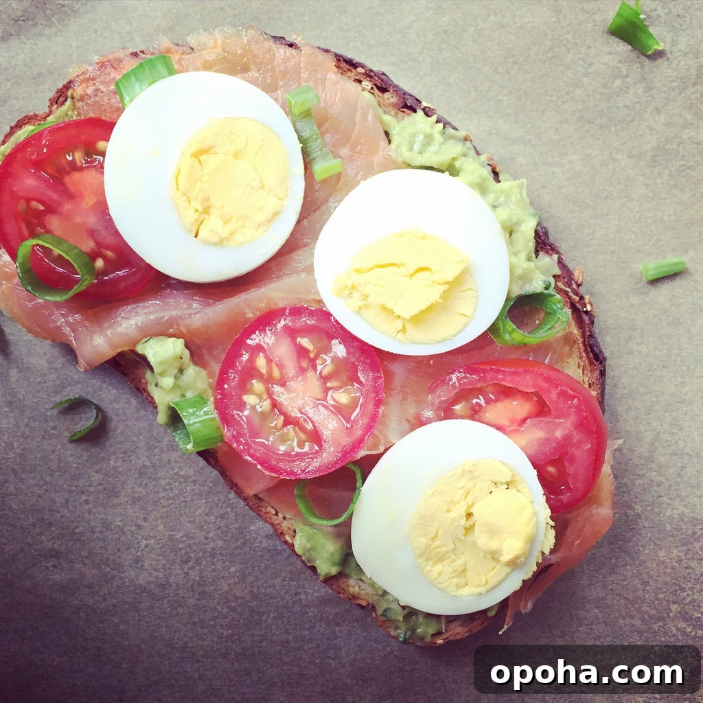 Avocado Toast with Smoked Salmon, Tomato, and Egg via LizsHealthyTable.com