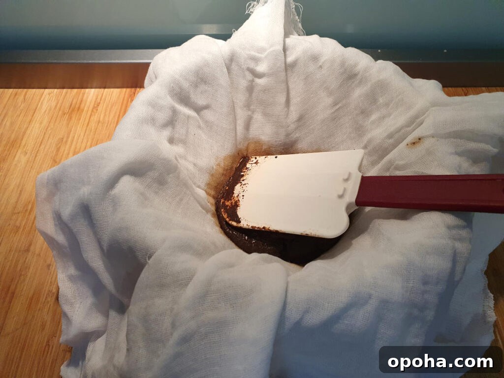 pressing coffee with spatular